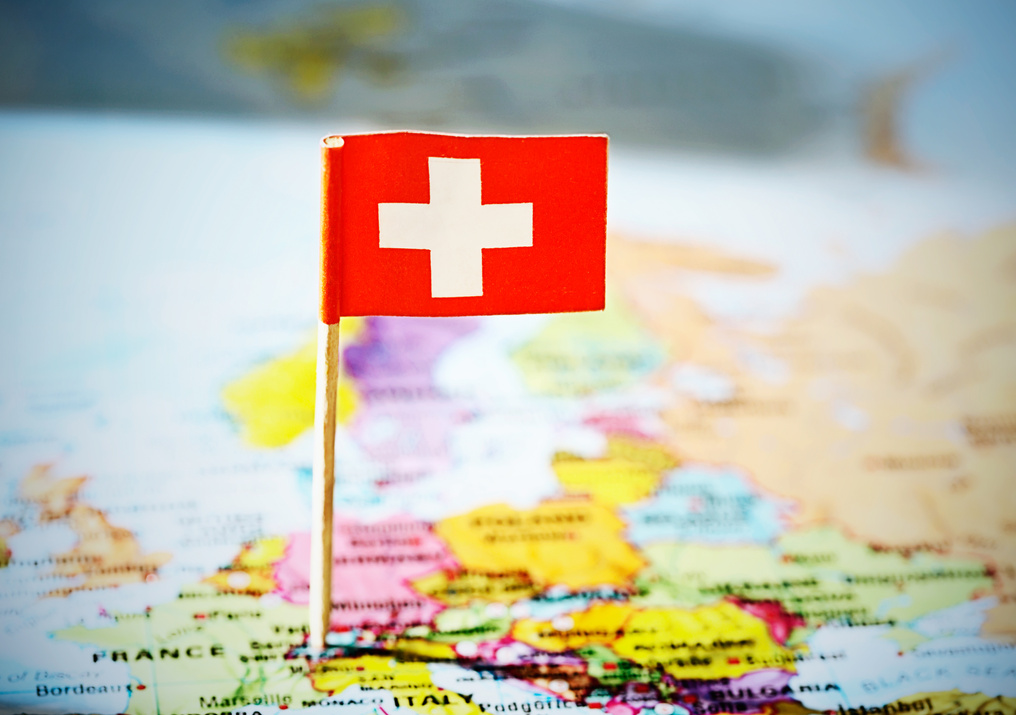 Swiss national flag marks Switzerland on European map